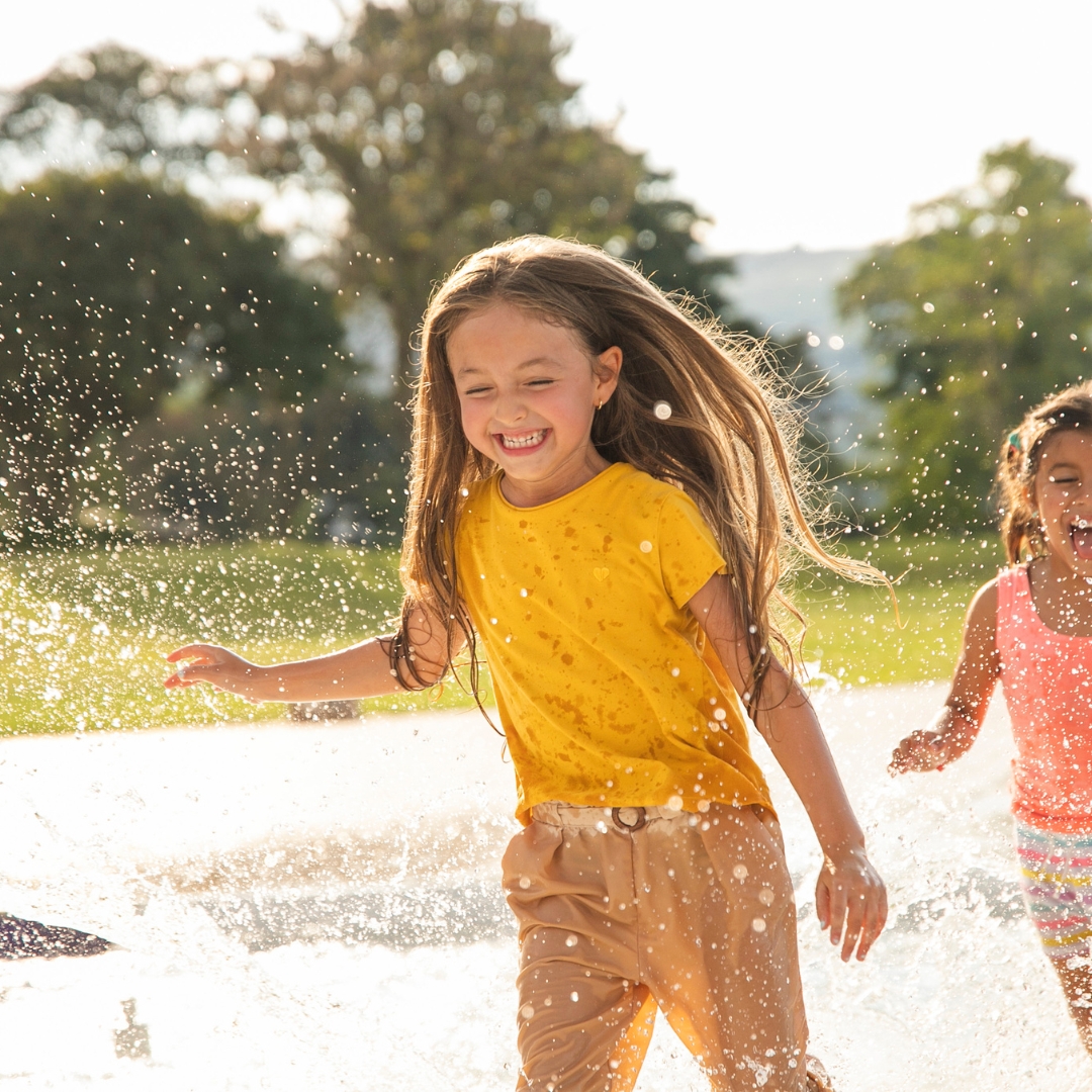image of a kid playing outside