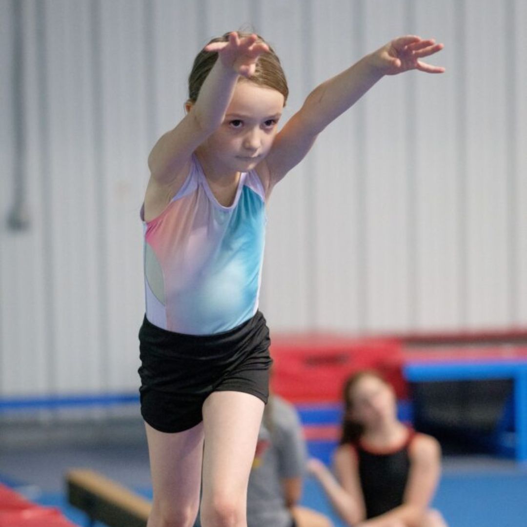 gymnast getting ready to do a cartwheel