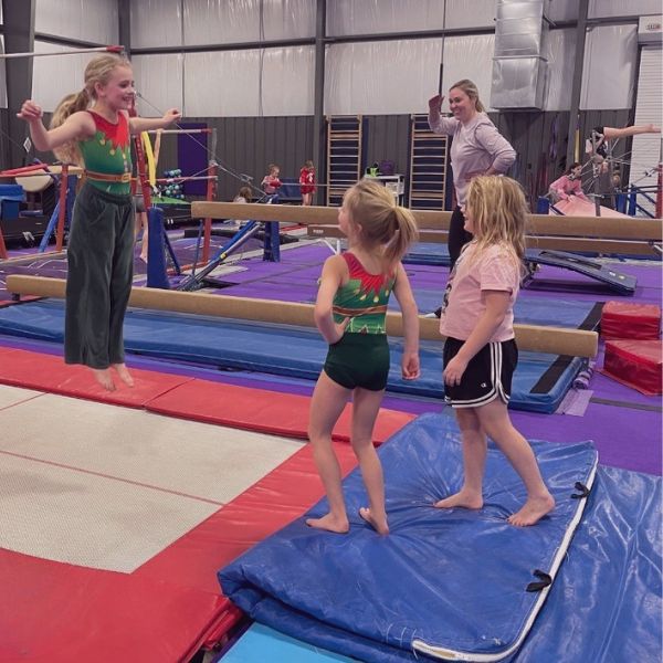 girls in gymnastics class